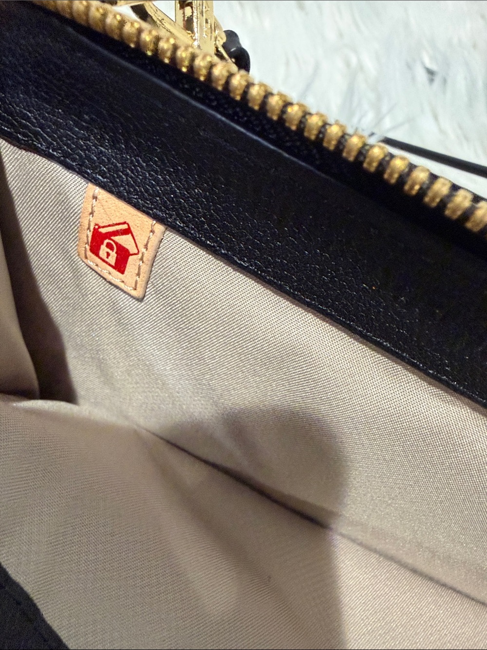 TUMI Crossbody with Gold tone Logo Accent Plate - Picture 12 of 16